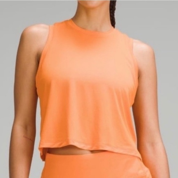 lululemon athletica Tops - Lululemon Women’s Ultralight Waist-Length Tank Top Sleeveleee in Orange Size 2